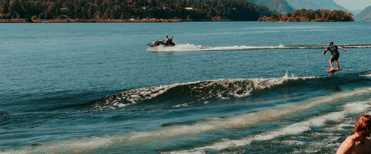 Foiling behind a boat on the Columbia River Gorge
