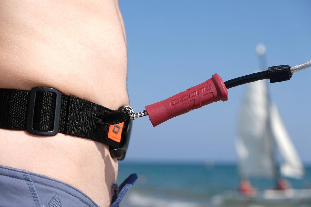 Ozone leash quick release between the waist strap and the leash line