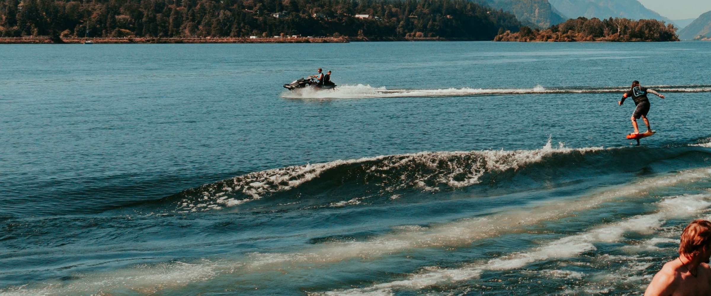 Foiling behind a boat on the Columbia River Gorge